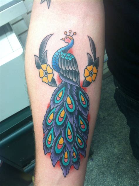 Traditional peacock tattoo - The rooster’s fearless nature and loud crowing have made it a symbol of courage and bravery. A rooster tattoo can represent an individual’s own courage and determination. Good Fortune. In some cultures, roosters are considered harbingers of good luck, symbolizing hope, new beginnings, and positivity. Protection and Vigilance.